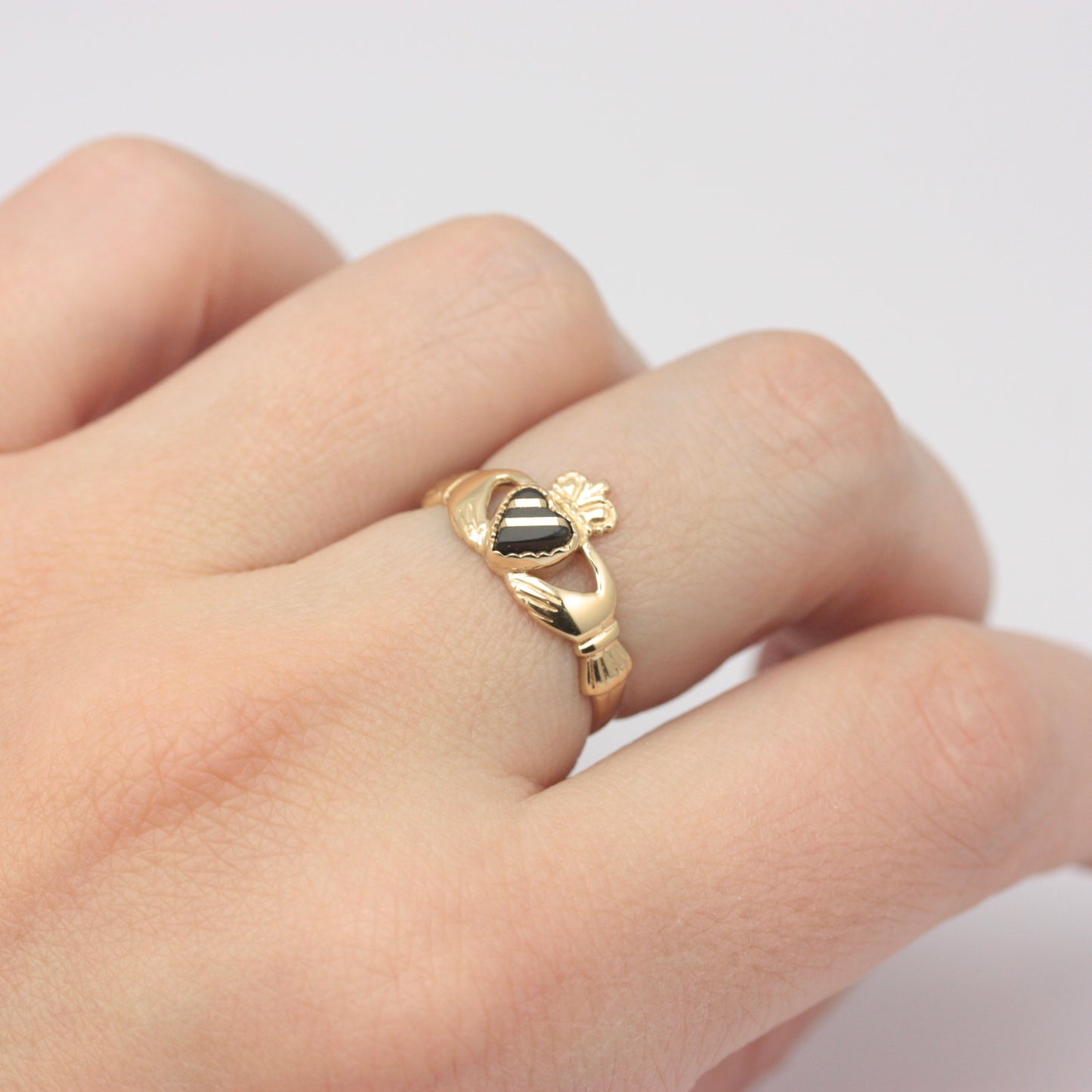 Vintage 9ct Gold Claddagh Ring with Gold Striped Black Onyx Heart, 1987
