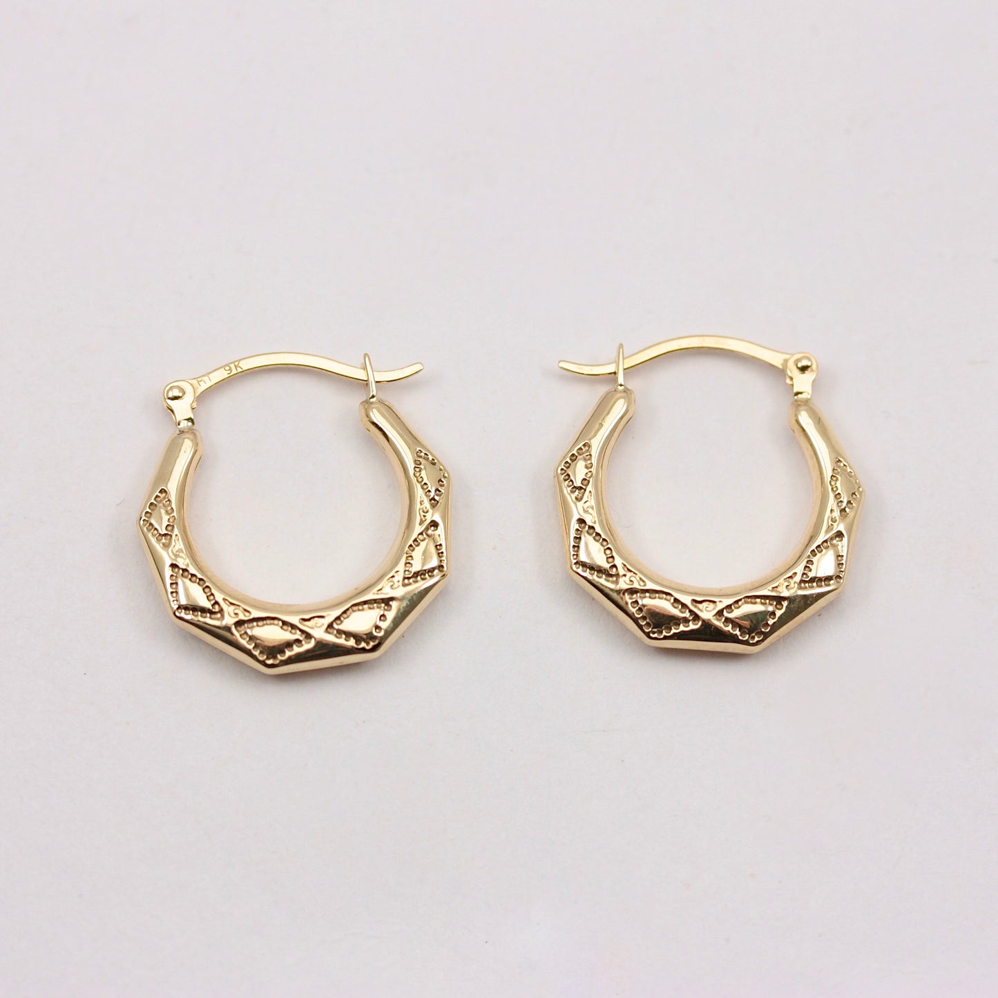 pre-owned 9ct yellow gold angled hoop earrings