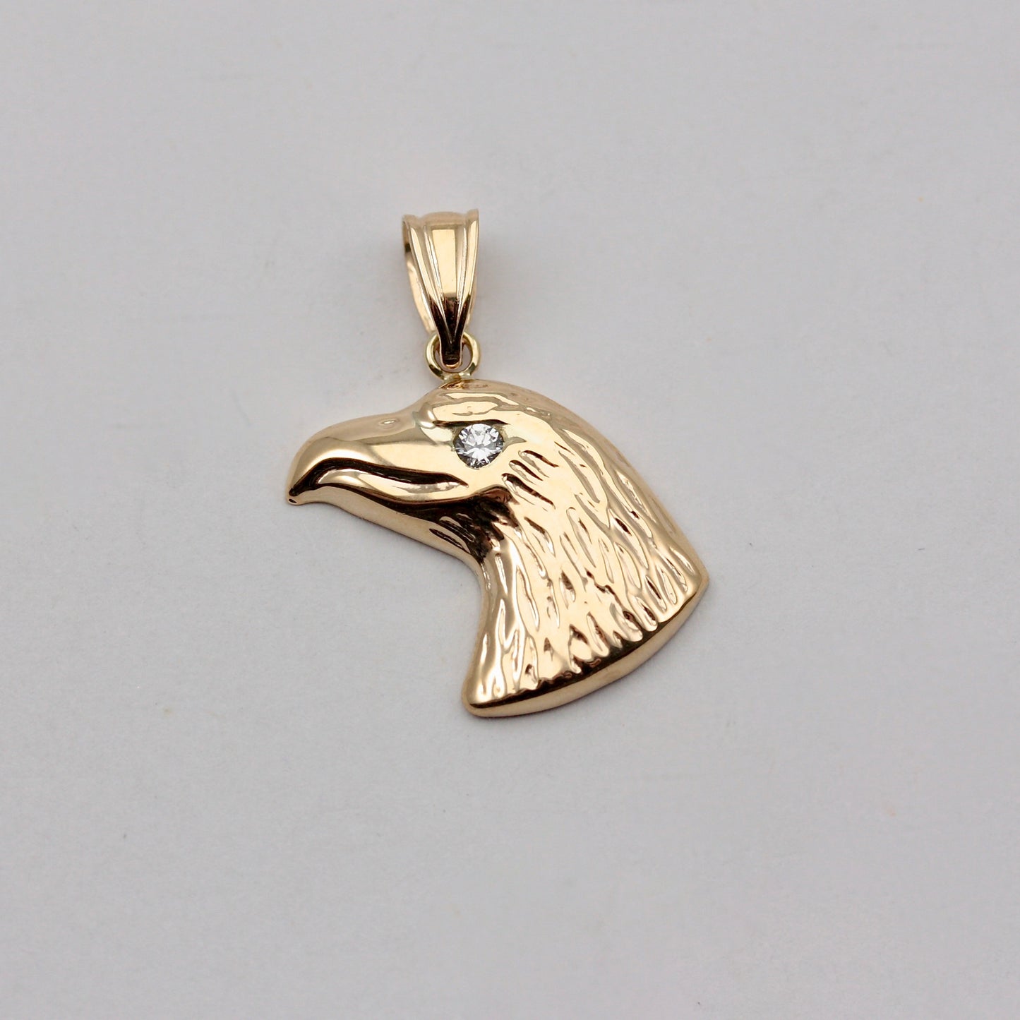 9ct gold eagle head pendant