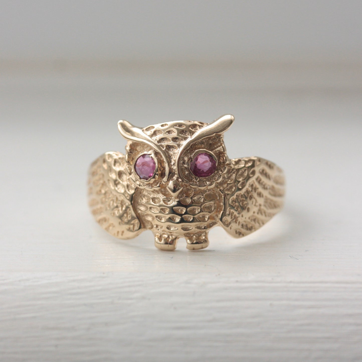 gold and garnet owl ring