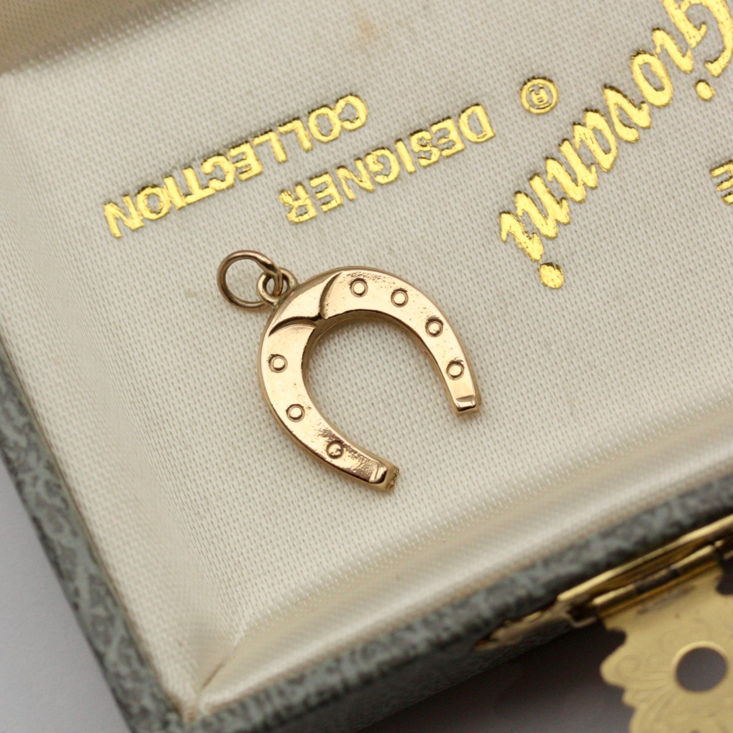 vintage gold horseshoe charm 1974