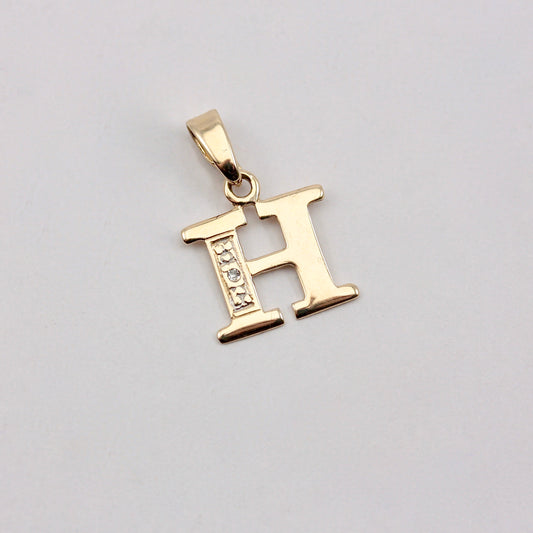 small 9ct gold diamond letter h pendant 