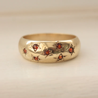 Vintage 9ct Gold Domed Ring with Star Set Garnets