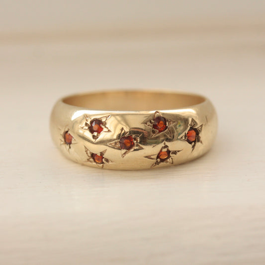 Vintage 9ct Gold Domed Ring with Star Set Garnets