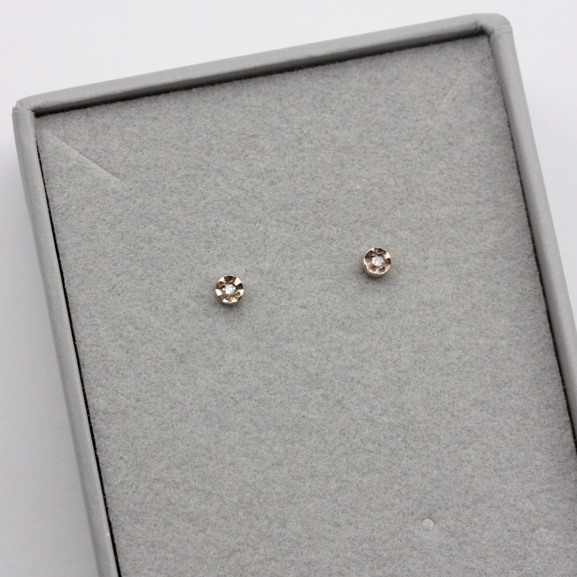 tiny vintage 9ct gold diamond stud earrings