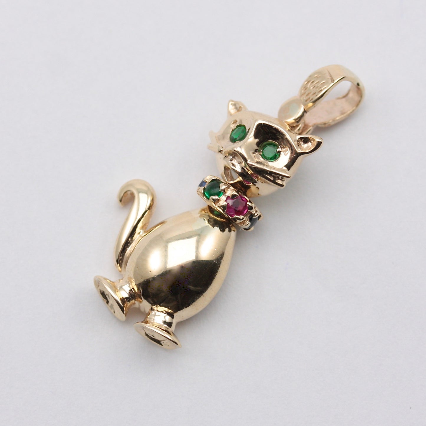 Modern Pre-owned 9ct Gold Cat Pendant set with Gemstones