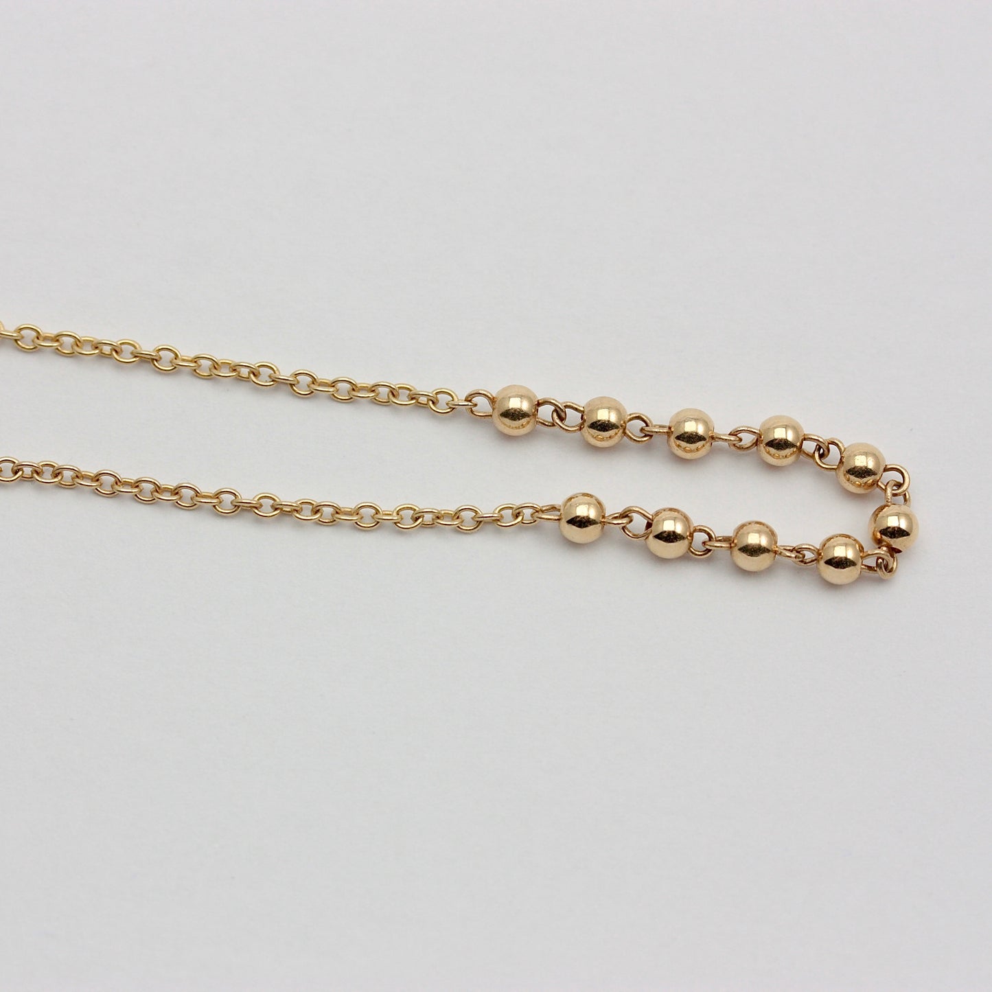Modern Pre-owned 14Kt Gold Ball and Cable Chain Bracelet