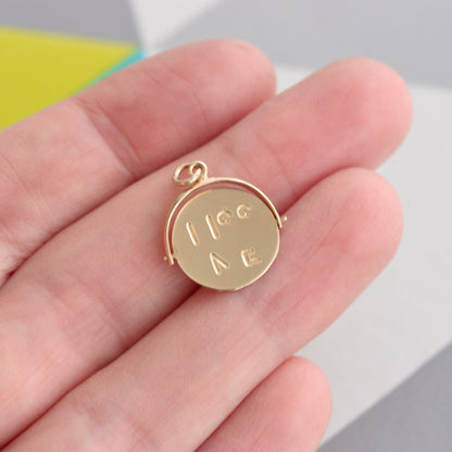 vintage 9ct gold kiss me spinning charm