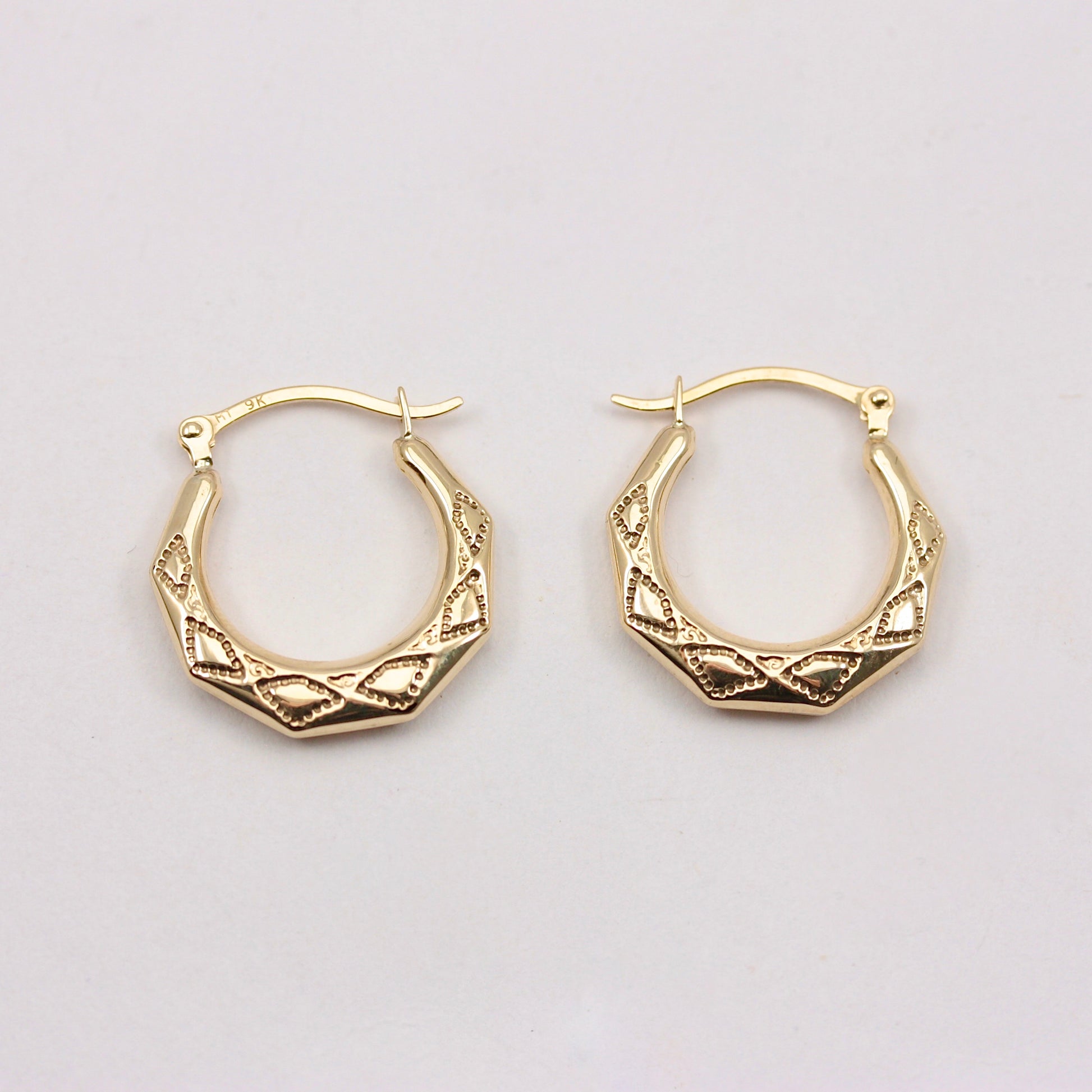 pre-owned 9ct yellow gold angled hoop earrings