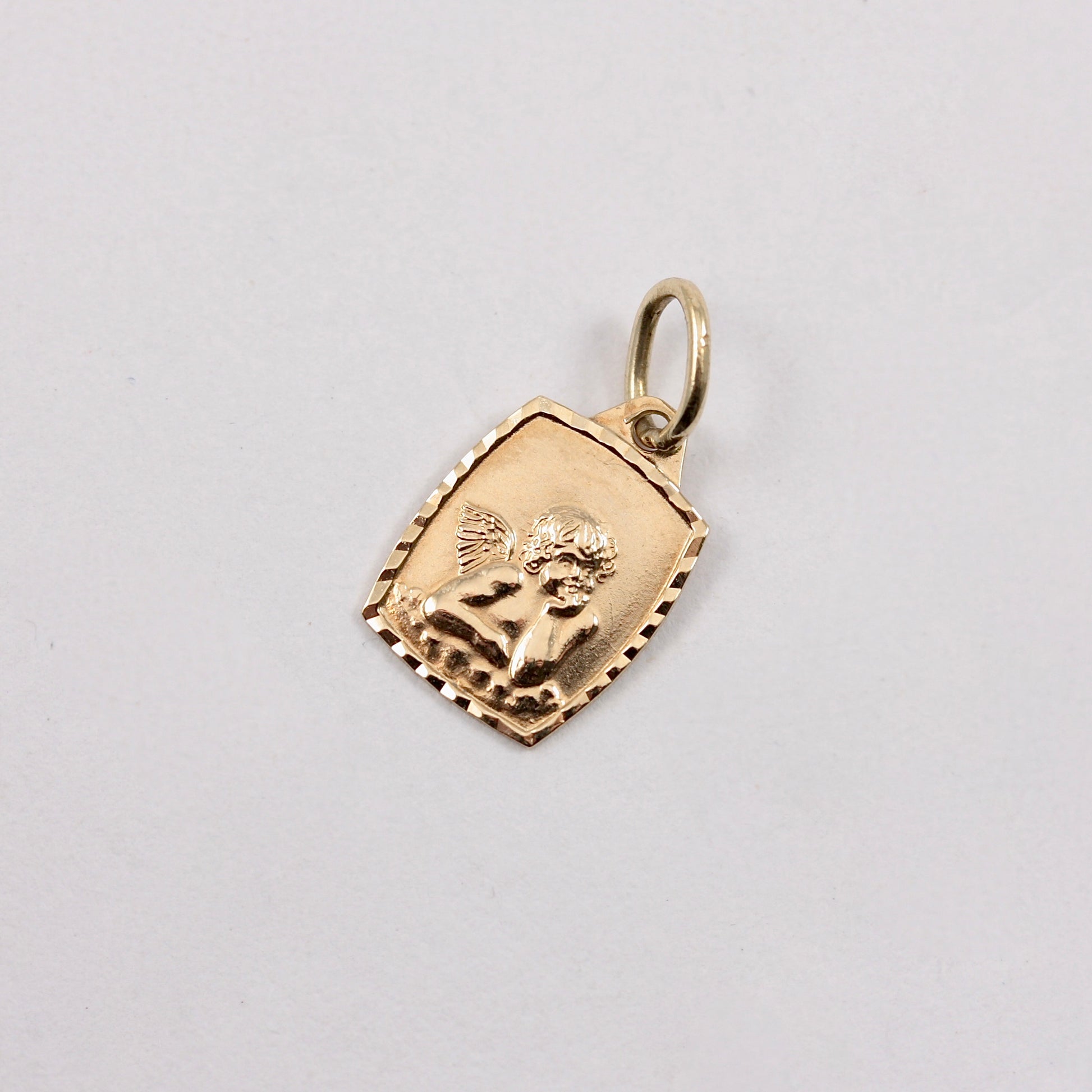 tiny vintage 9ct gold cherub charm