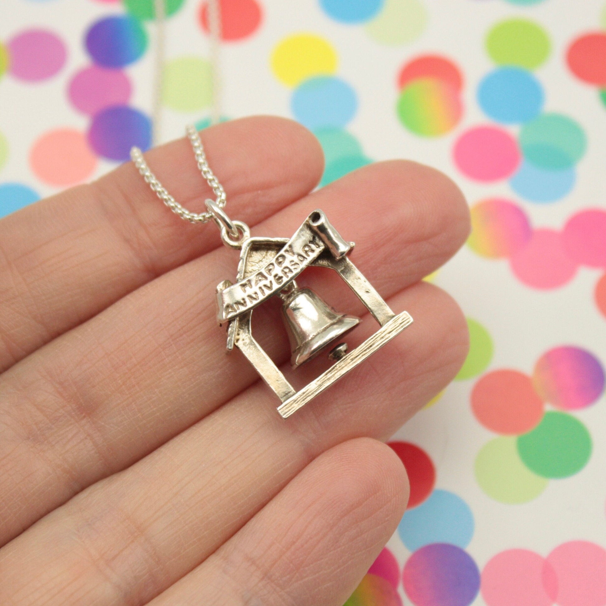 vintage silver articulated bell charm
