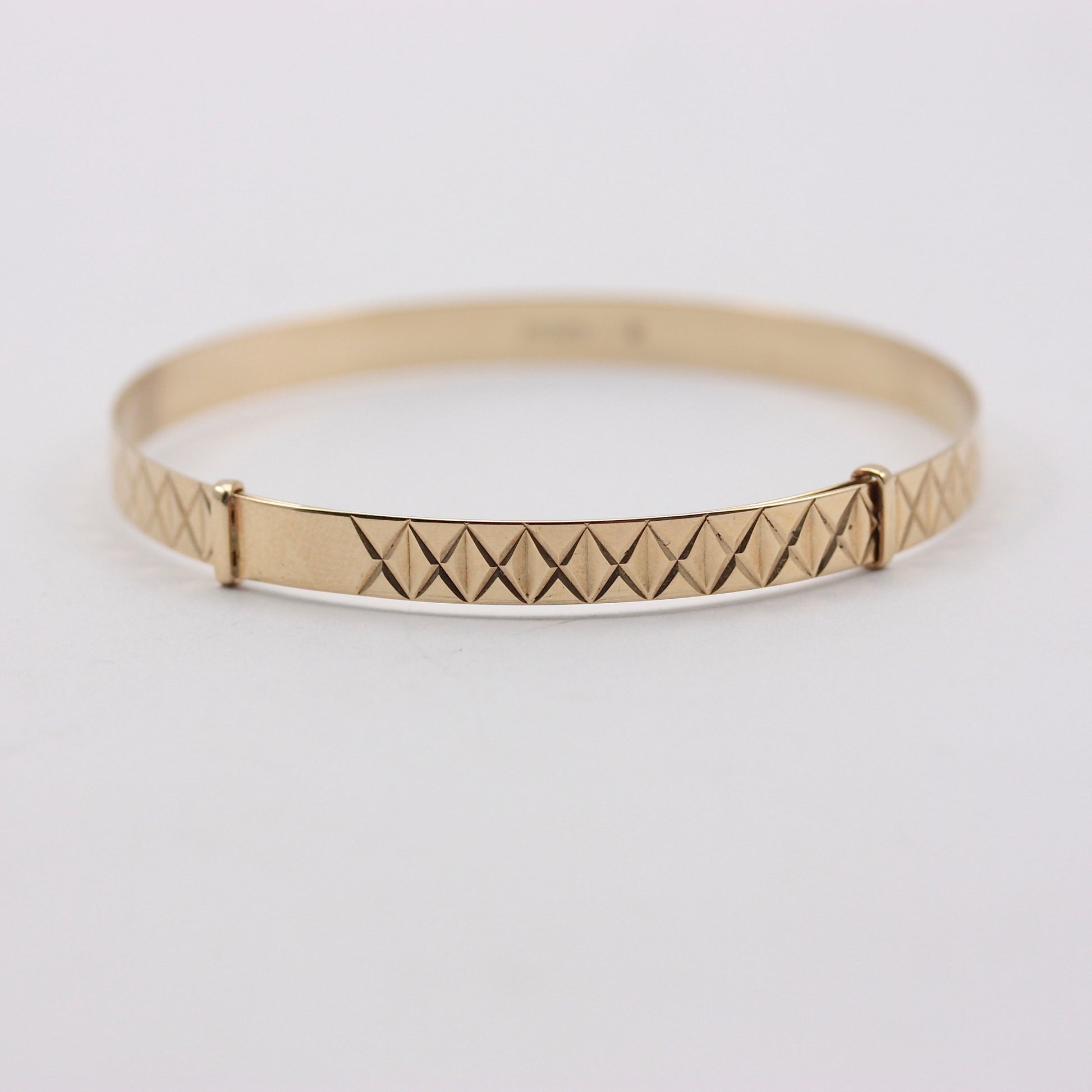 9ct gold patterned expandable bangle