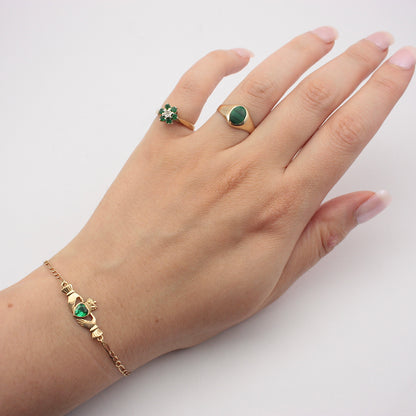 Pre-owned 9ct Gold Claddagh Figaro Bracelet with Green CZ