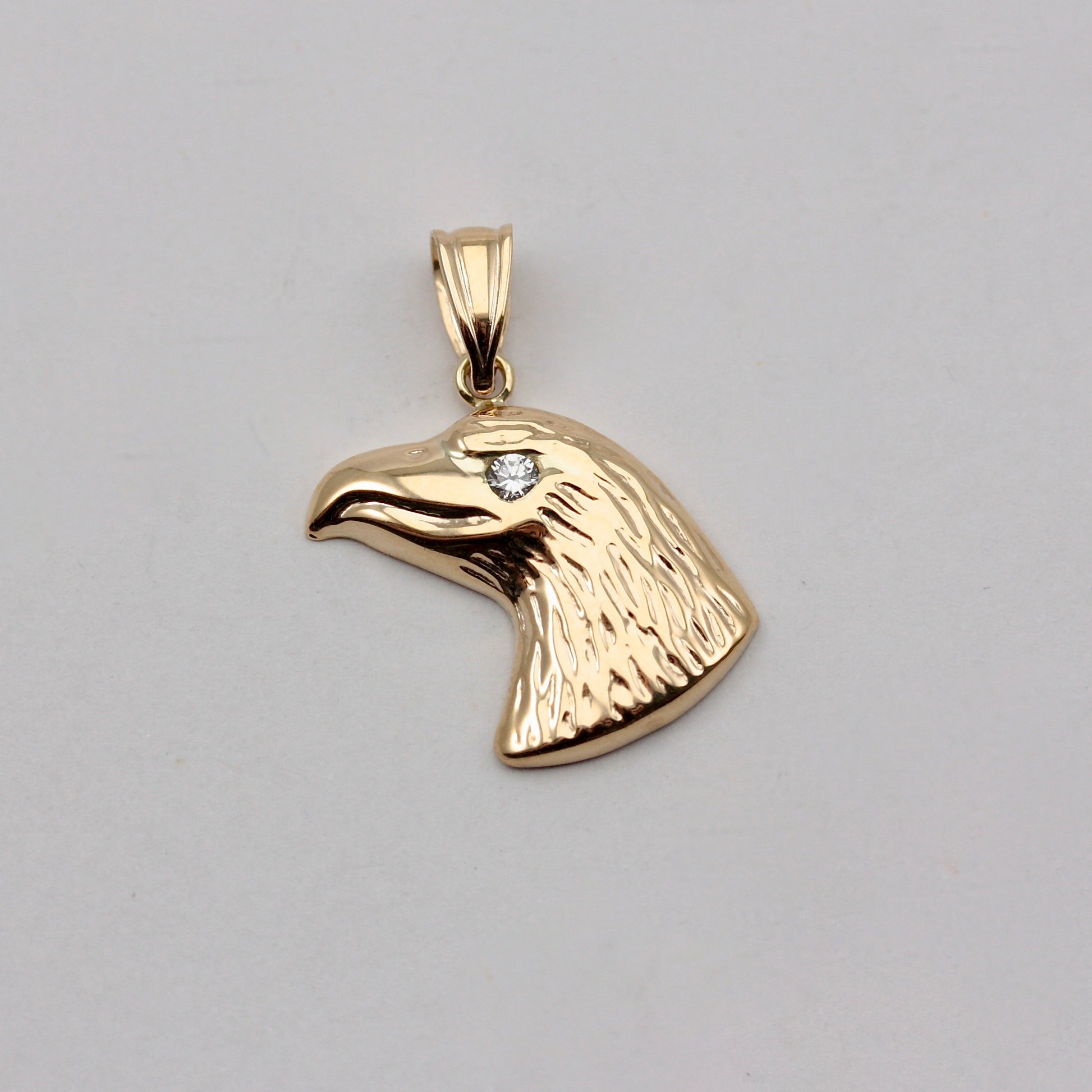 9ct gold eagle head pendant