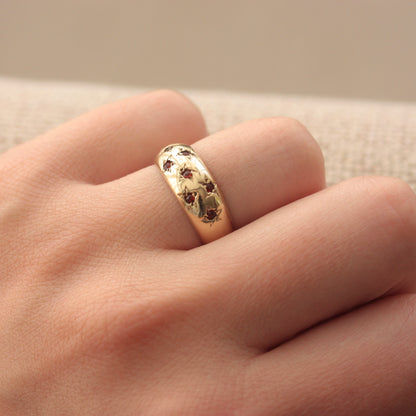 Vintage 9ct Gold Domed Ring with Star Set Garnets