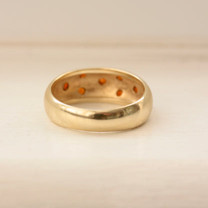 Vintage 9ct Gold Domed Ring with Star Set Garnets
