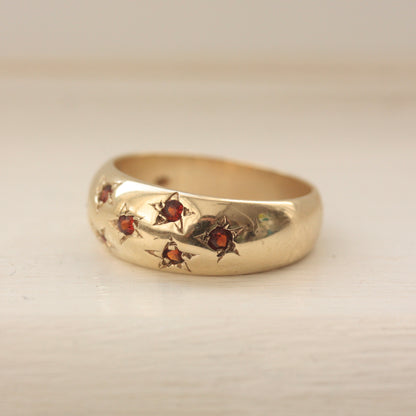 Vintage 9ct Gold Domed Ring with Star Set Garnets