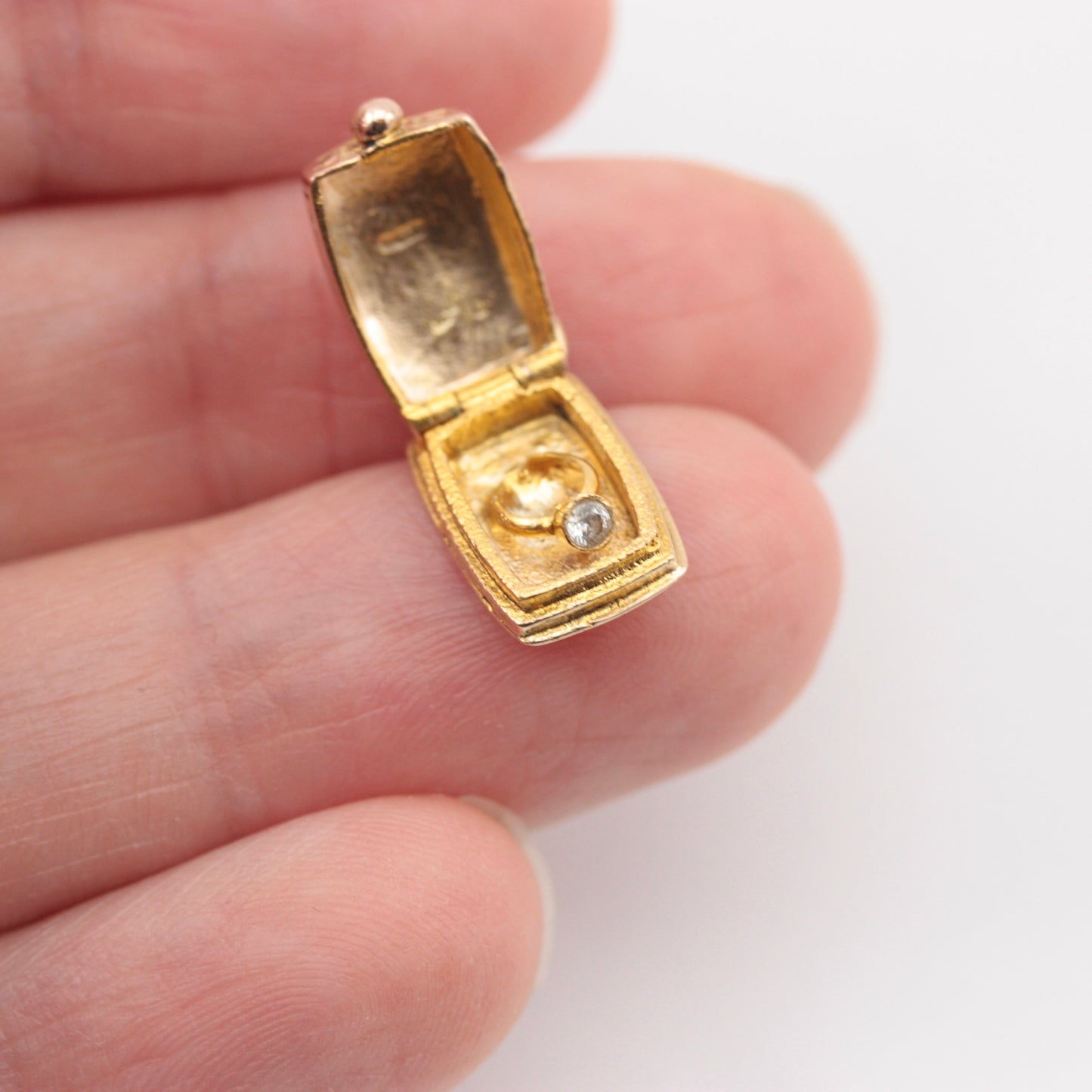 opening vintage engagement ring in box charm