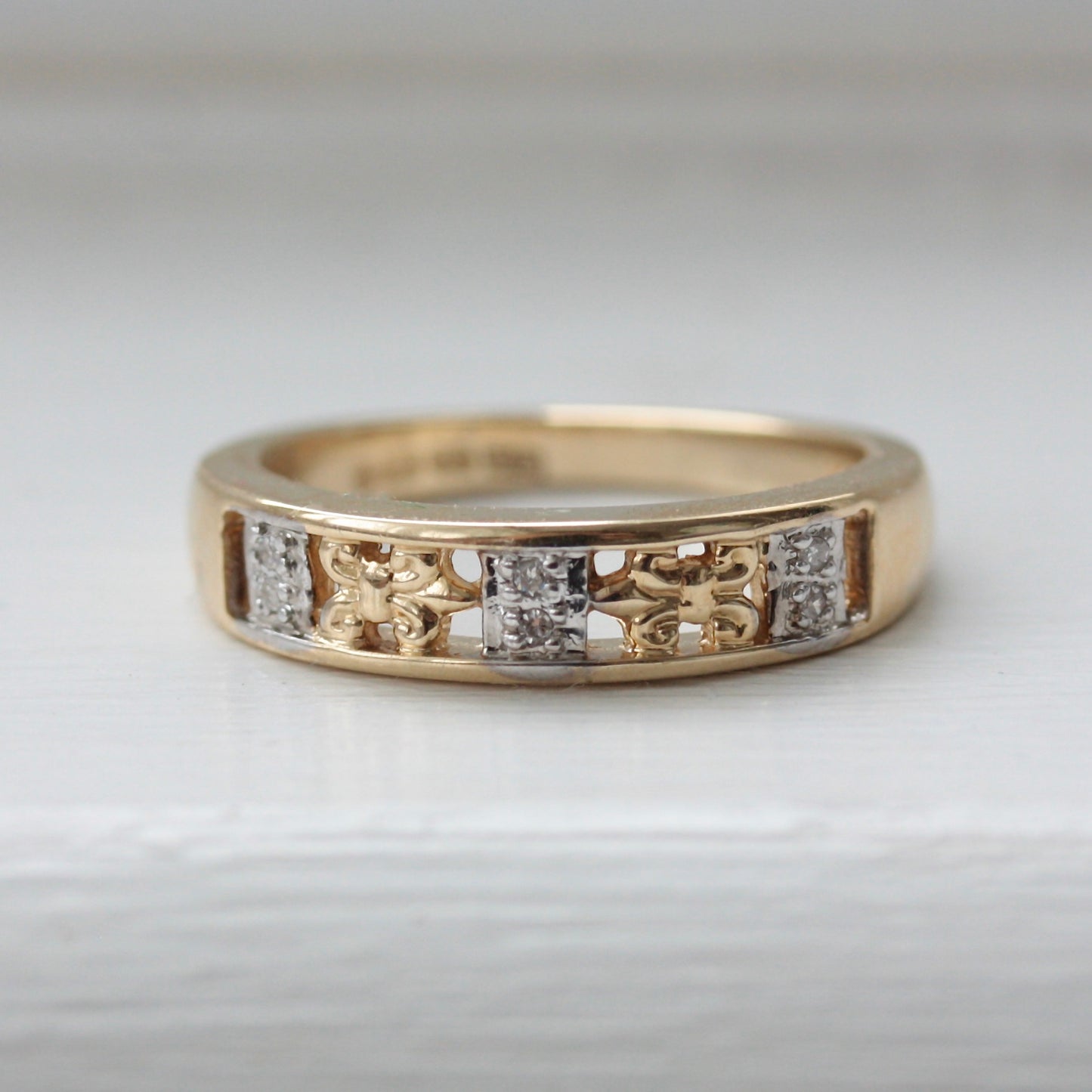 solid 9ct yellow gold band with diamonds