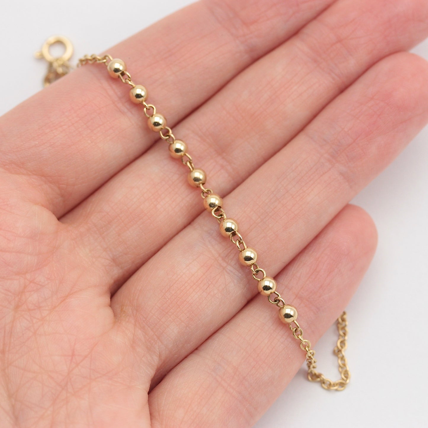 Modern Pre-owned 14Kt Gold Ball and Cable Chain Bracelet