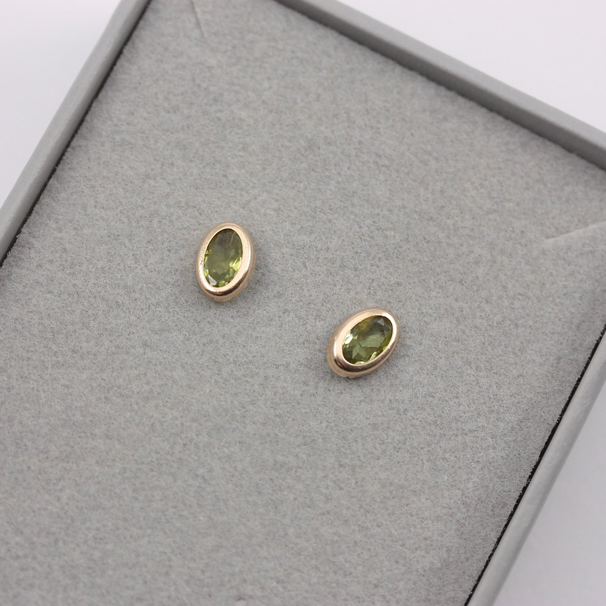 9ct gold oval peridot stud earrings