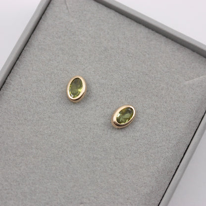 9ct gold oval peridot stud earrings