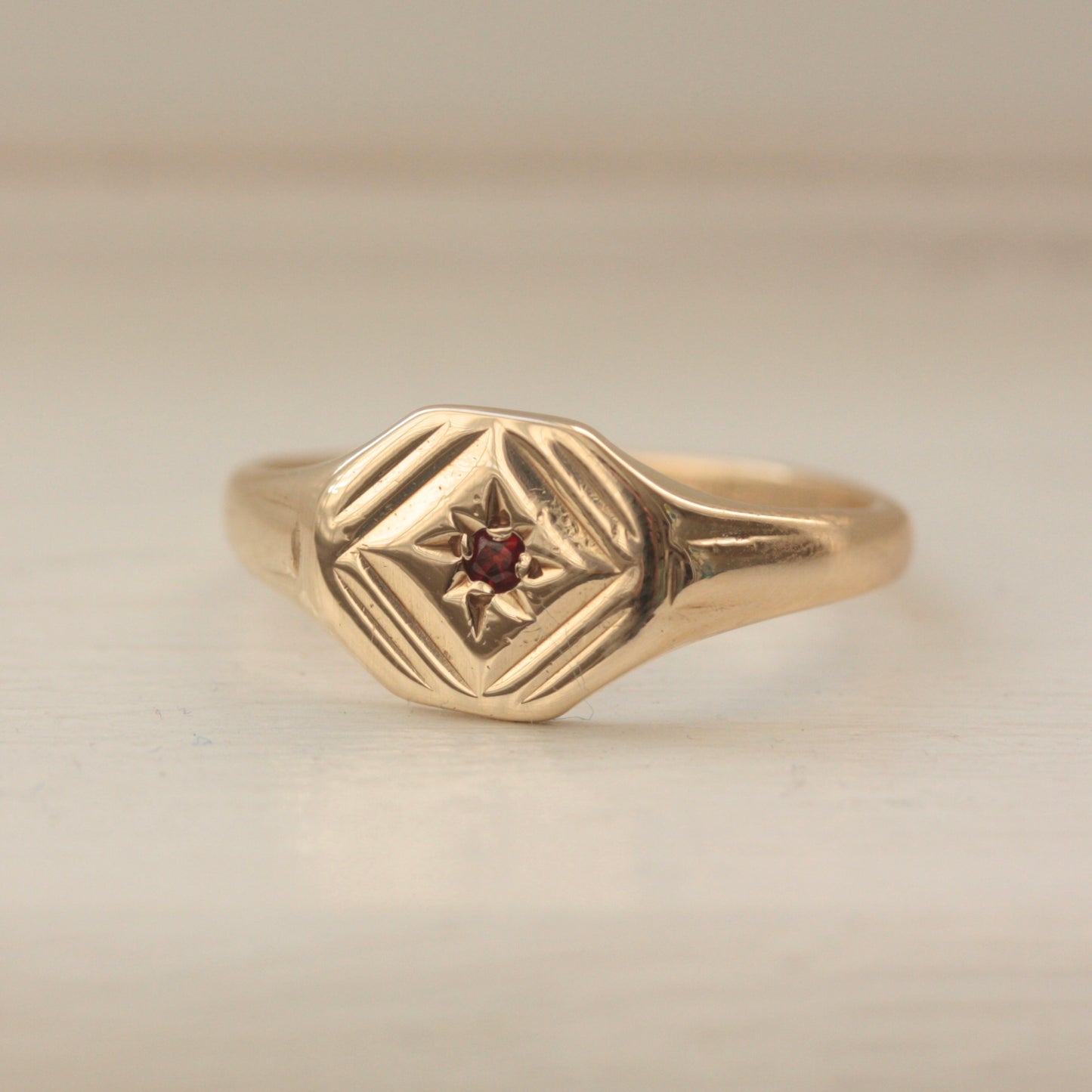 Vintage 9ct Gold Star Set Garnet Signet Ring, 1970