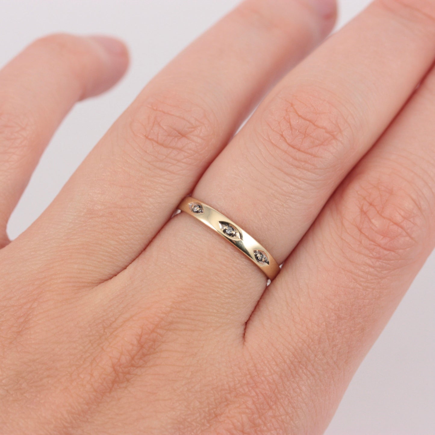 pre-owned slim 9ct gold band with diamonds