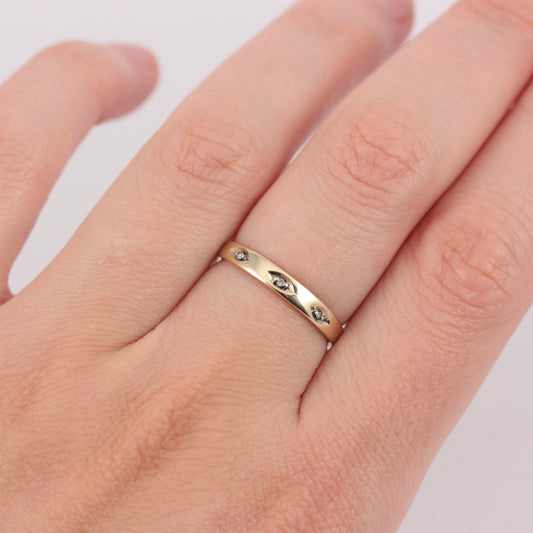pre-owned slim 9ct gold band with diamonds
