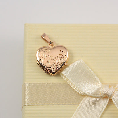 pre-owned 9ct gold heart locket
