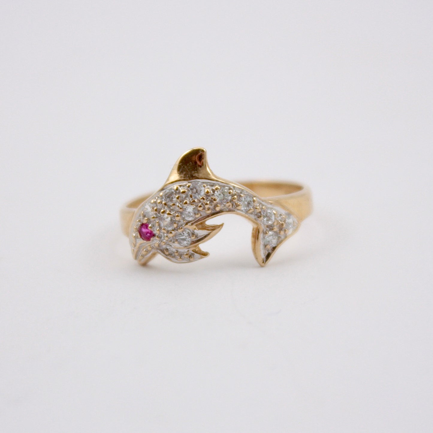 Pre-owned gold dolphin ring with CZ