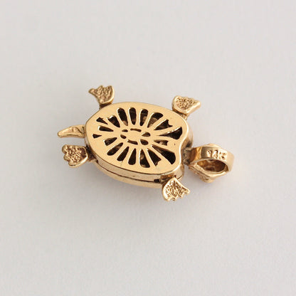 Vintage Articulated Turtle Pendant with Enamel Shell and Ruby Eyes