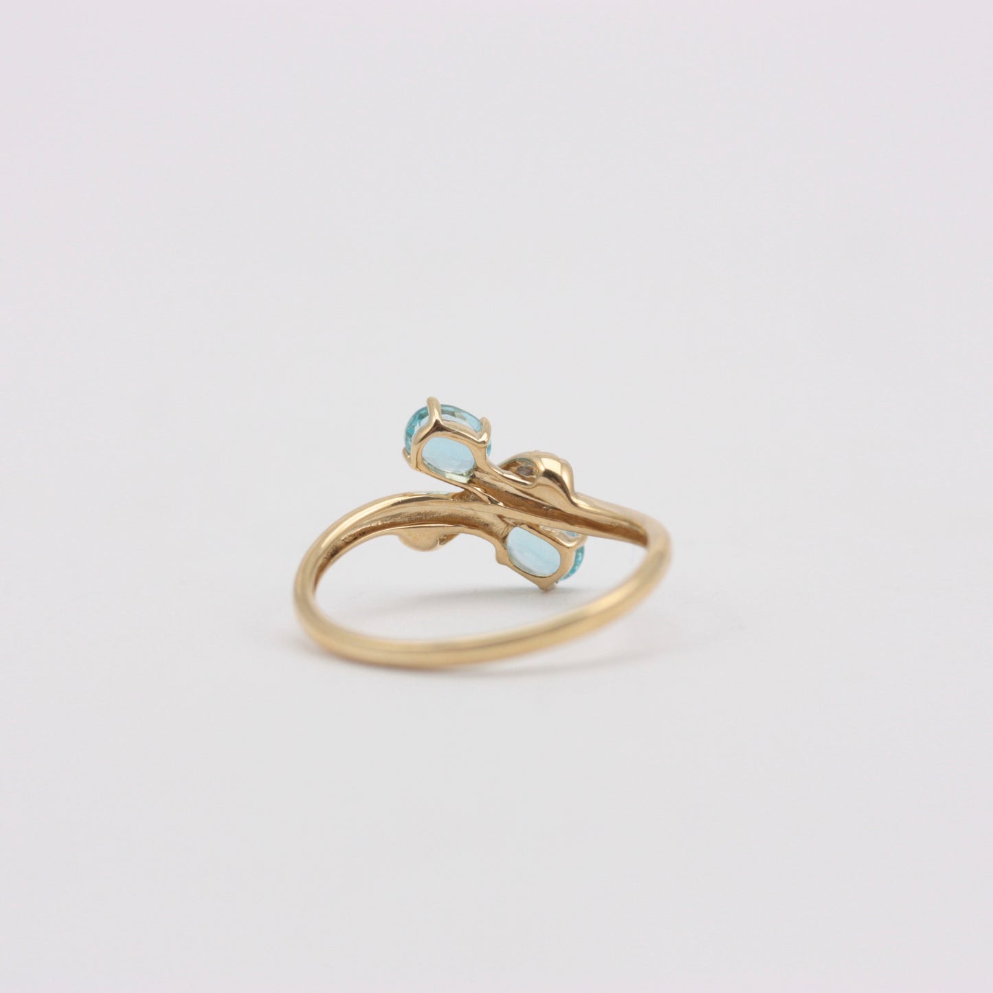 Pre-owned 9ct Gold Crossover Ring with Diamonds & Topaz Blue CZ