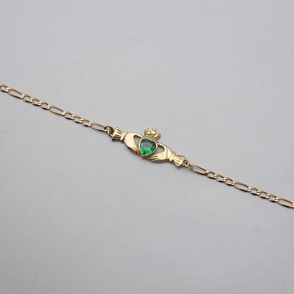 Pre-owned 9ct Gold Claddagh Figaro Bracelet with Green CZ