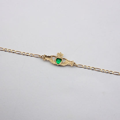 Pre-owned 9ct Gold Claddagh Figaro Bracelet with Green CZ