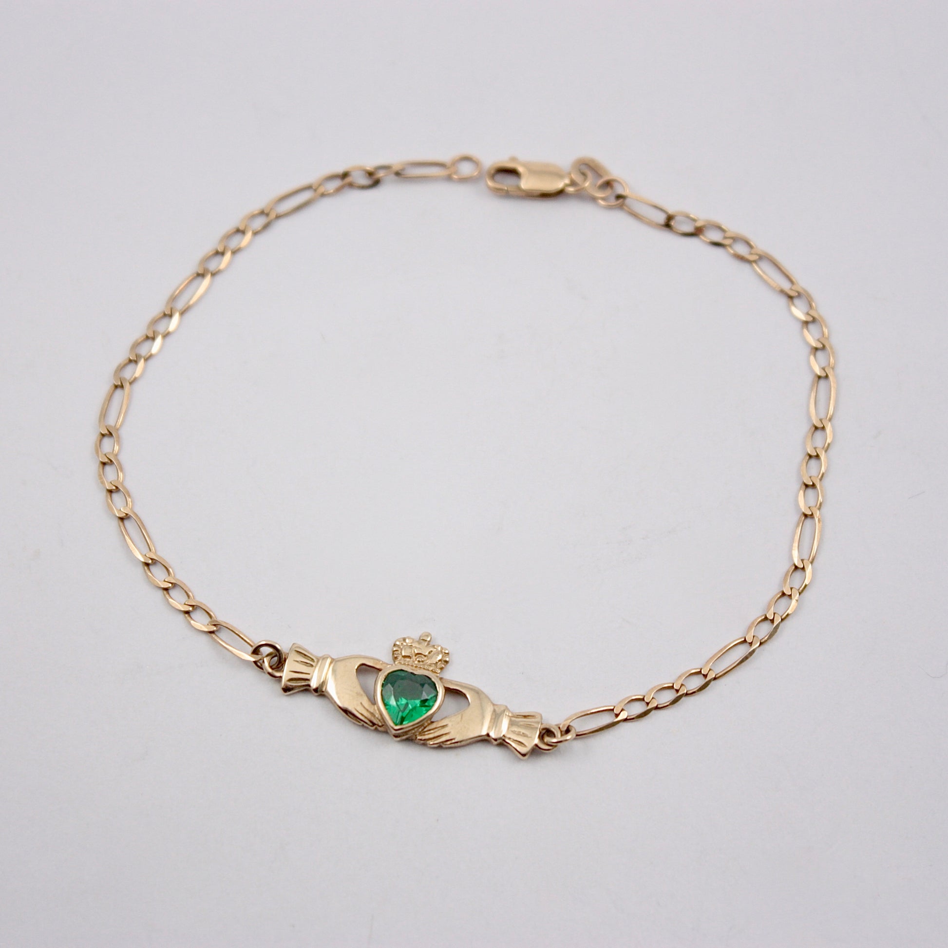 pre-owned 9ct gold claddagh figaro bracelet