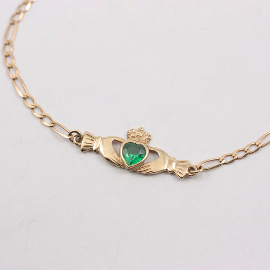 Pre-owned 9ct Gold Claddagh Figaro Bracelet with Green CZ