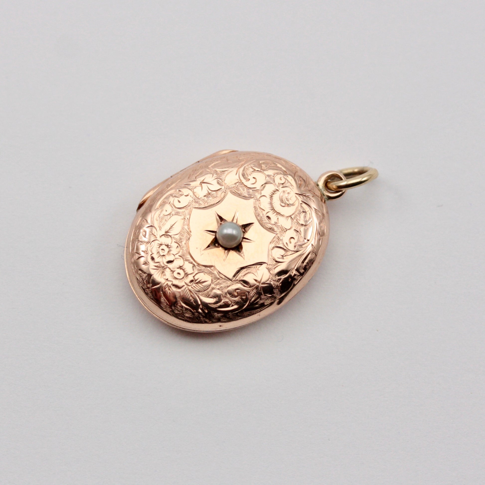 antique 9ct gold floral engraved locket