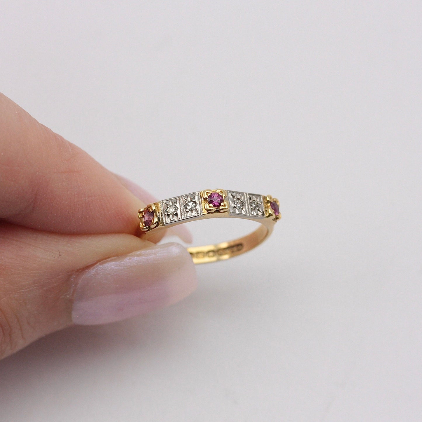 18ct gold ruby and diamond angled band ring
