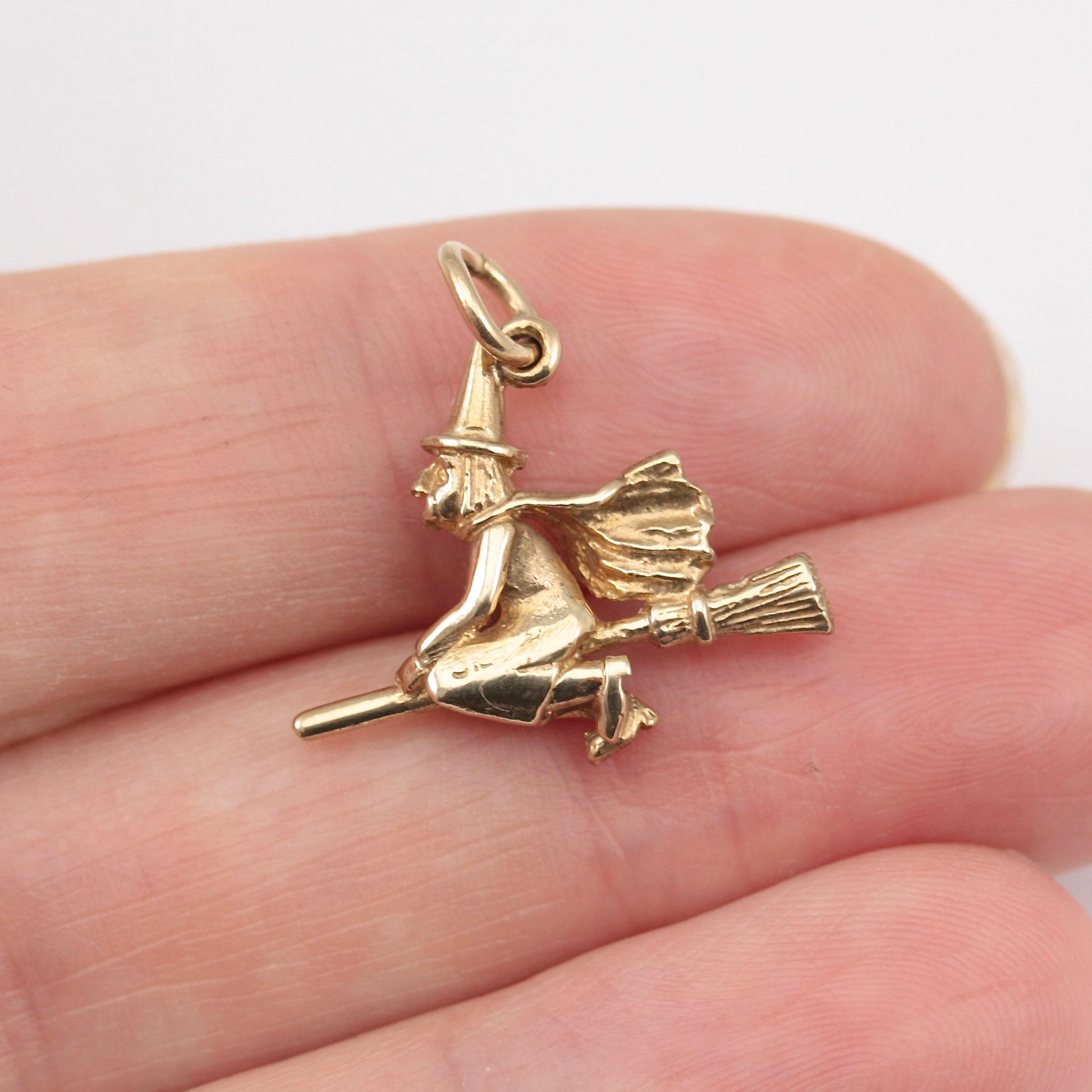 9ct gold witch on broom charm
