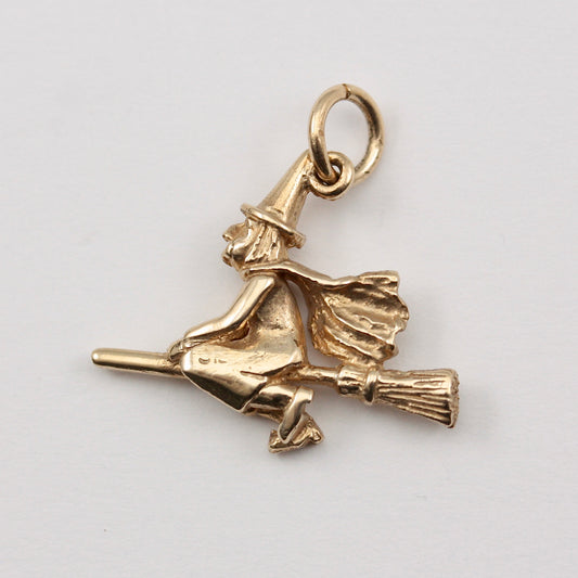 pre-owned 9ct gold witch on broom charm