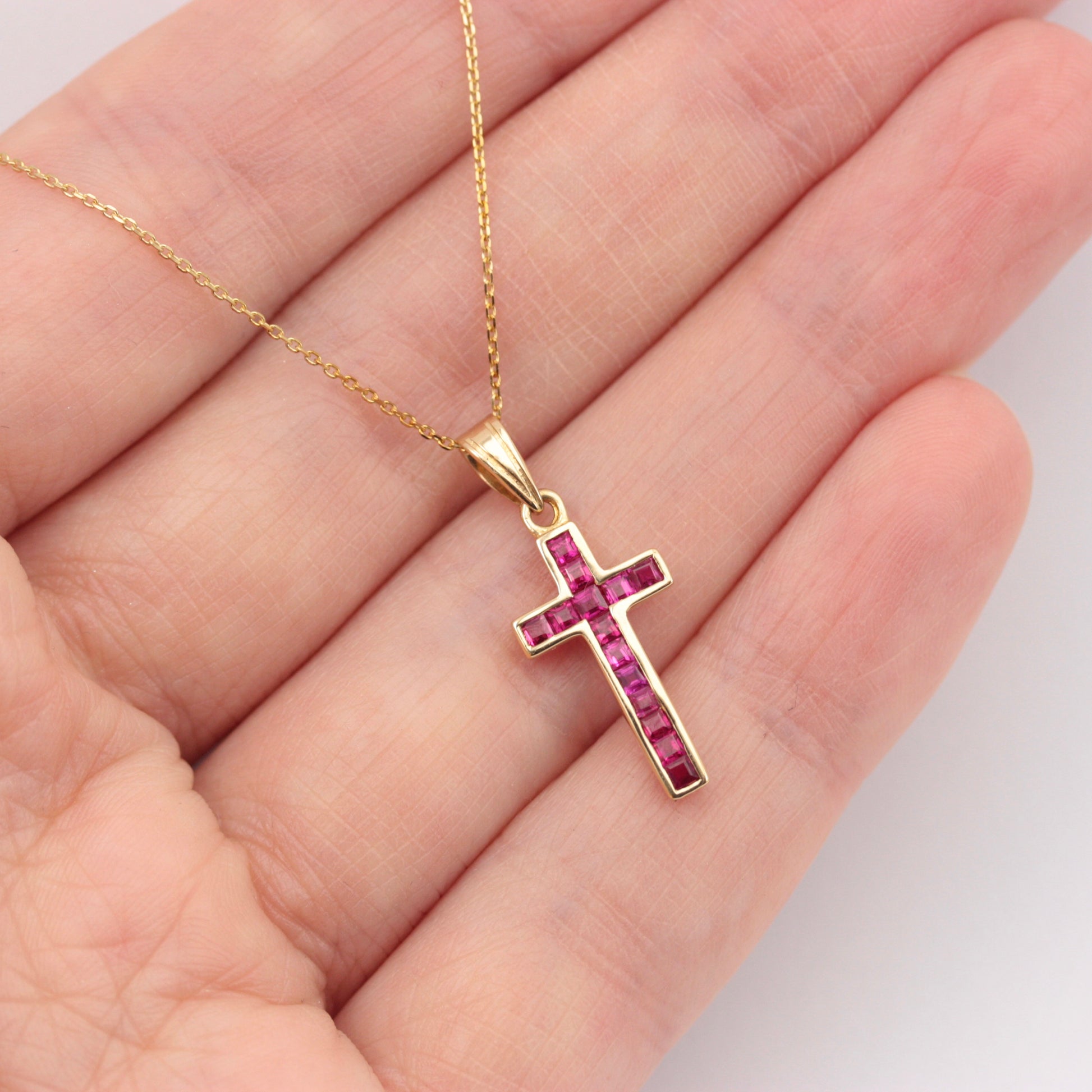 pre-owned 9ct gold ruby cross pendant