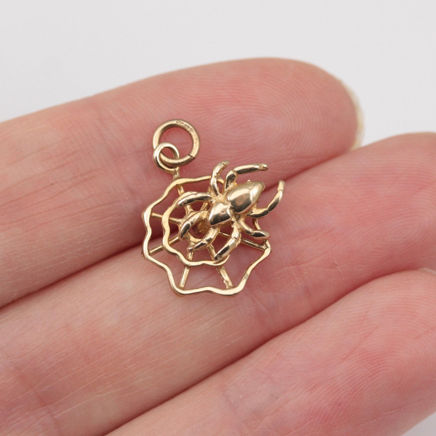 9ct gold articulated spider on web charm