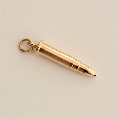 vintage gold bullet charm