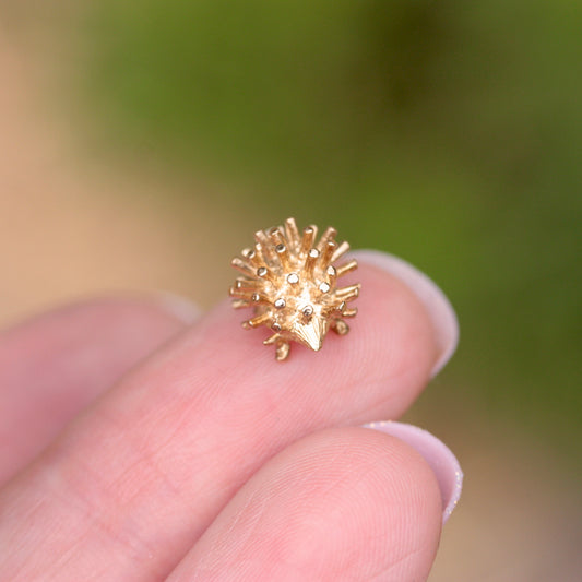small vintage gold hedgehog charm
