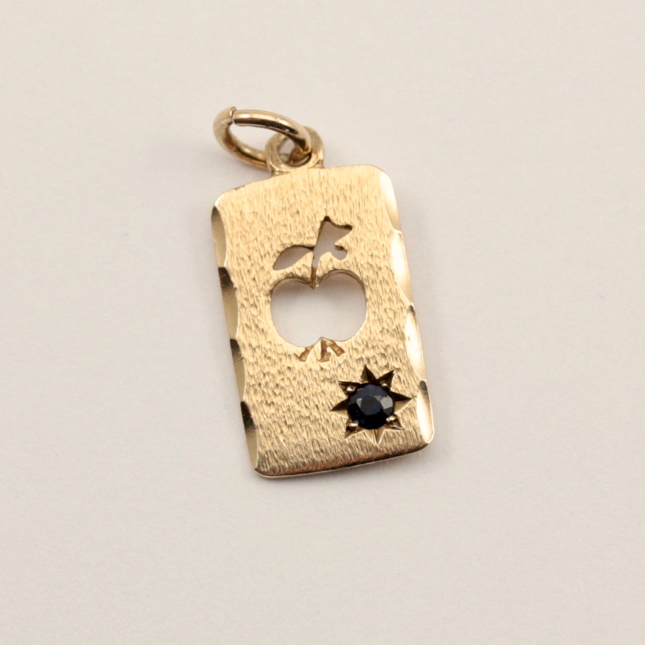 apple cut out star set sapphire pendant 