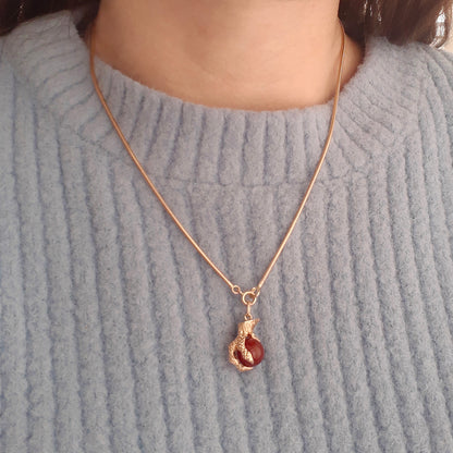 vintage 9ct gold claw and carnelian ball charm