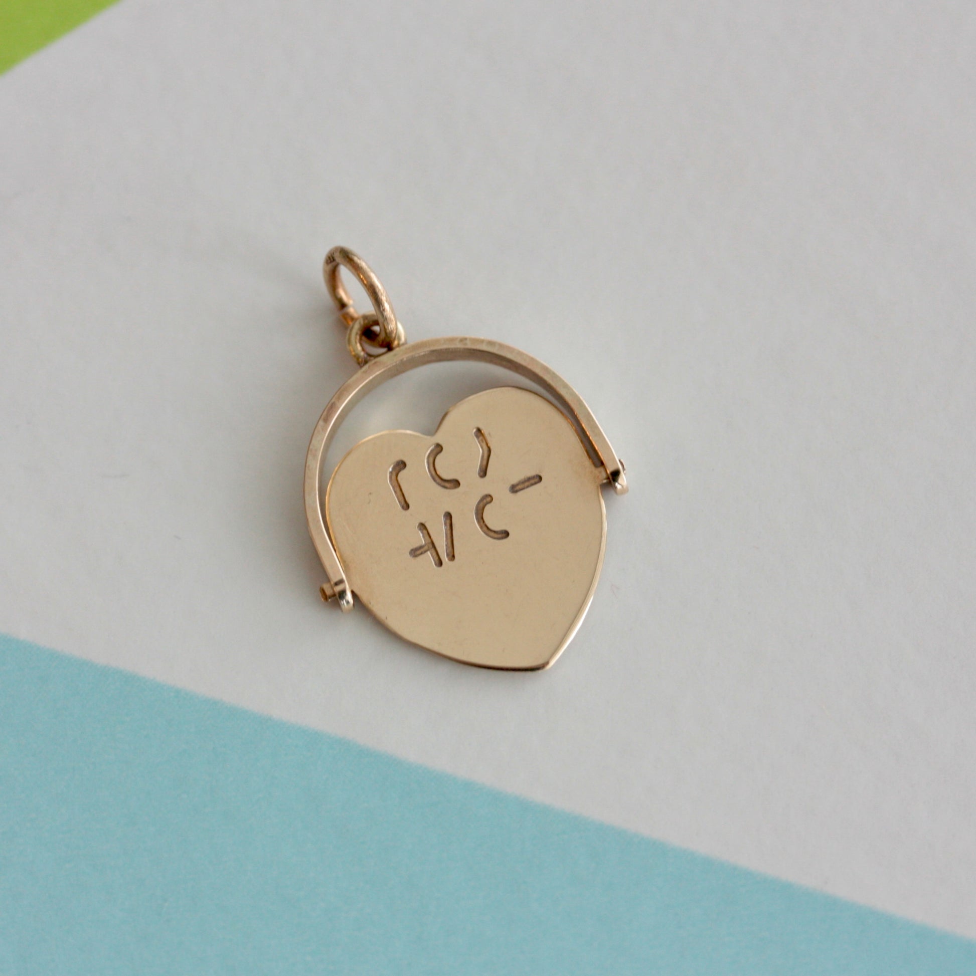 vintage 9ct gold spinner charm 1960s