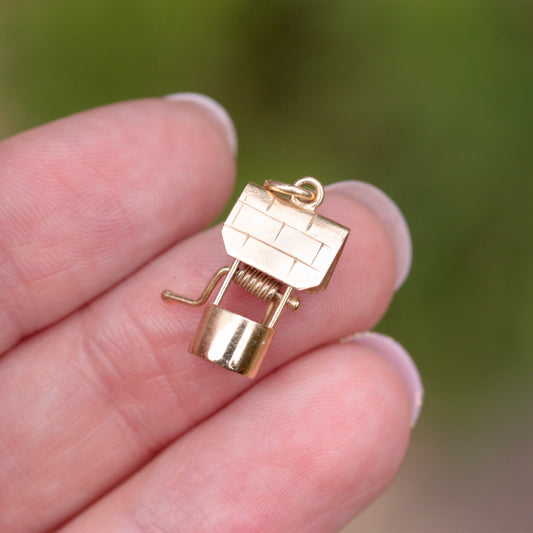 vintage gold wishing well charm