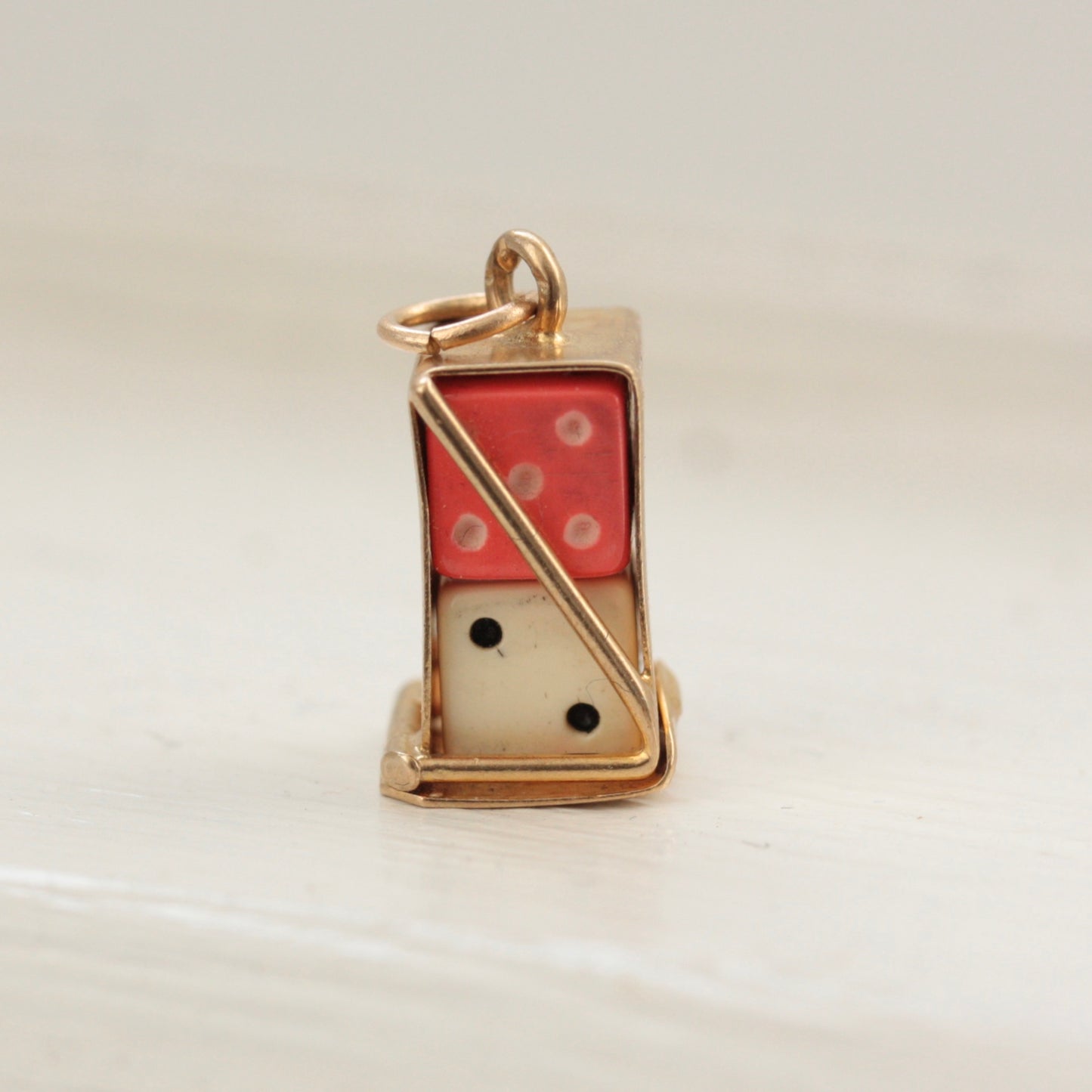 vintage gold boxed dice charm